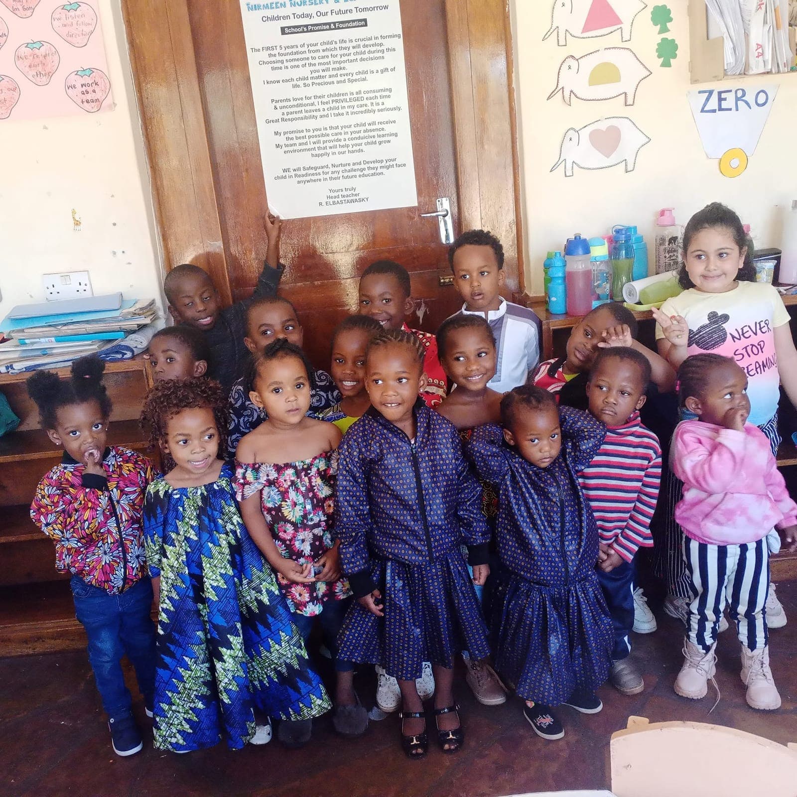 A class at Nirmeen, Belvedere, dressed in traditional and colourful outfits for a celebration day